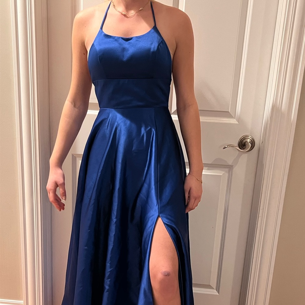 Navy blue dress worn once from prom. i’m 5,6 and it just reaches the floor.